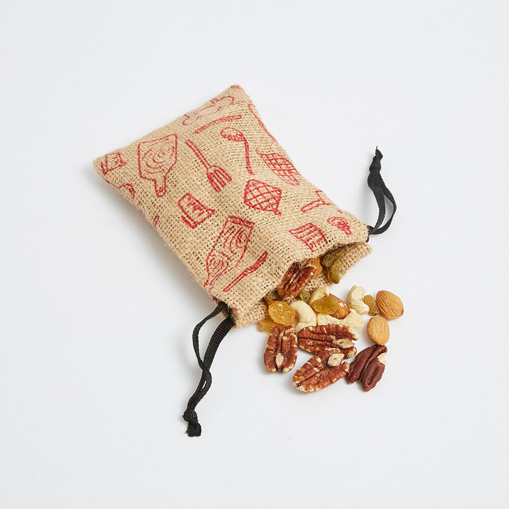 mini-drawstring-bag-in-natural-jute mini drawstring bag in natural jute in black polycord drawstrings tied with end-knots - Ethical Manufacturer