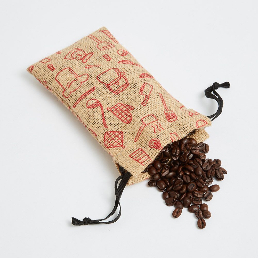 small-drawstring-bag-in-natural-jute small drawstring bag in natural jute black drawstrings tied with end-knots - Ethical Supplier
